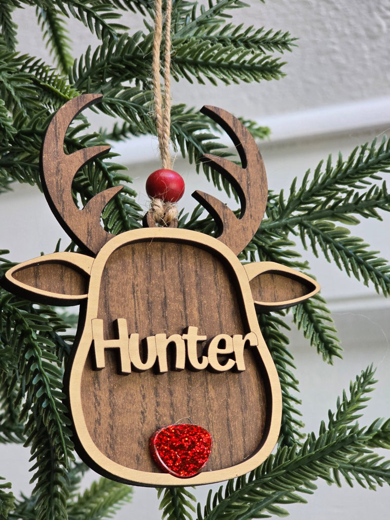 Personalized name ornament with reindeer holiday design