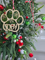 Decorative Christmas wreath with personalized ornaments on a green background