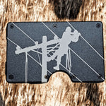 Black metal lineman wallet money clip with engraved climber design
