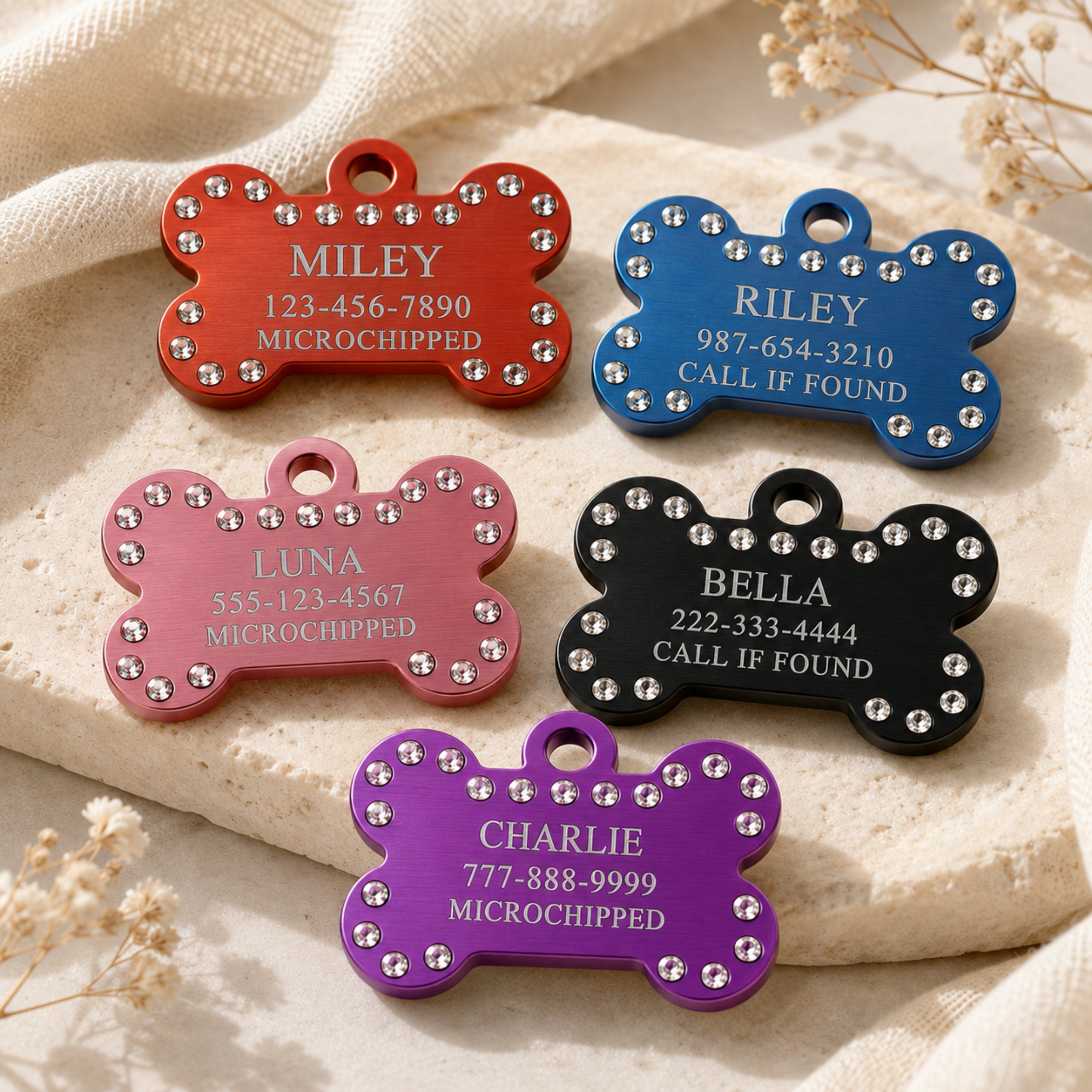Back side of crystal pet ID tags with engraved contact information examples