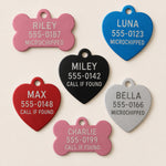 Back side of custom pet ID tags with engraved phone numbers and pet safety details