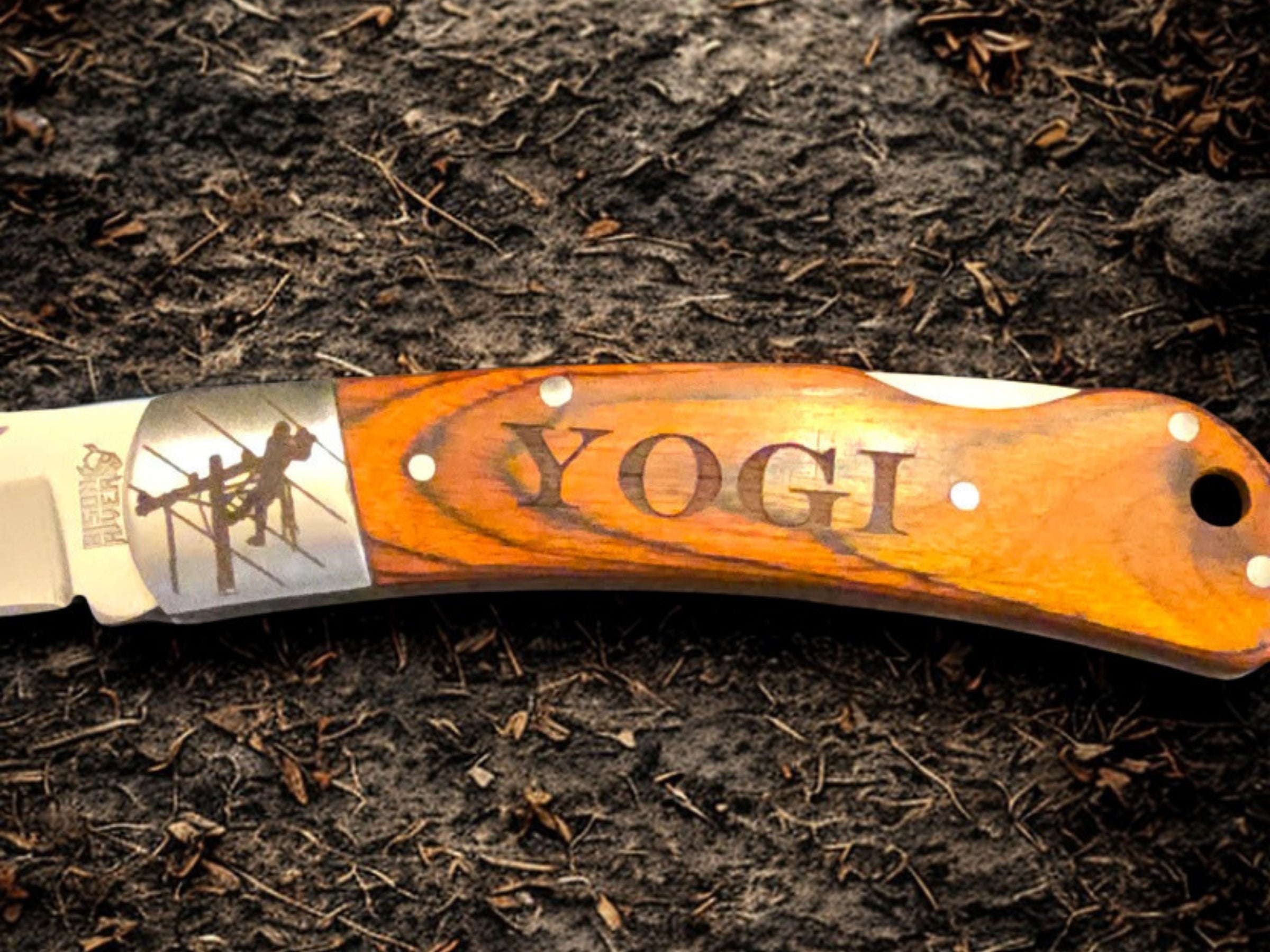 Engraved lineman folding knife with personalized name on wooden handle