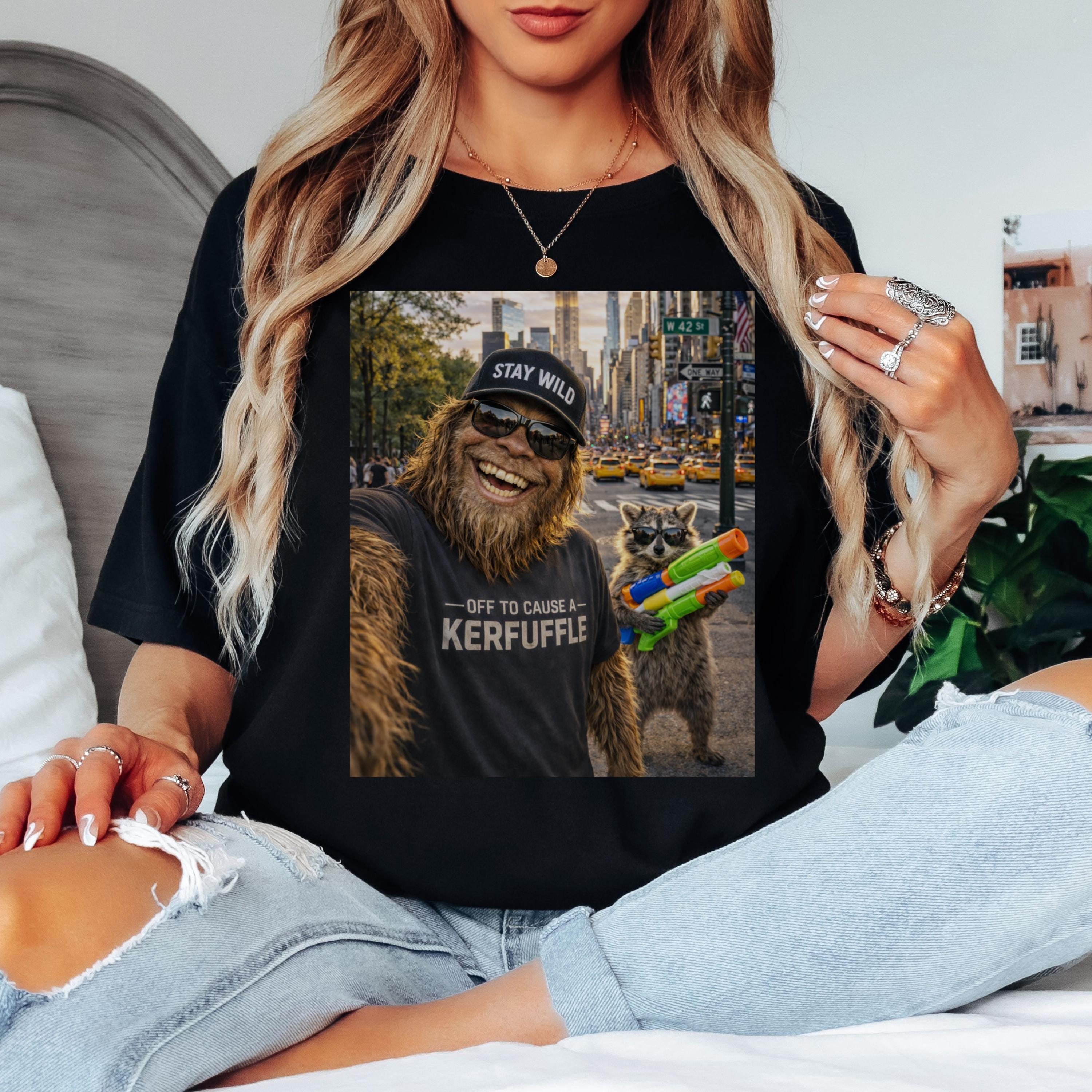Off To Cause A Kerfuffle Comfort Colors Shirt, Funny Raccoon Bigfoot Graphic Tee, Sasquatch Cryptid Shirt