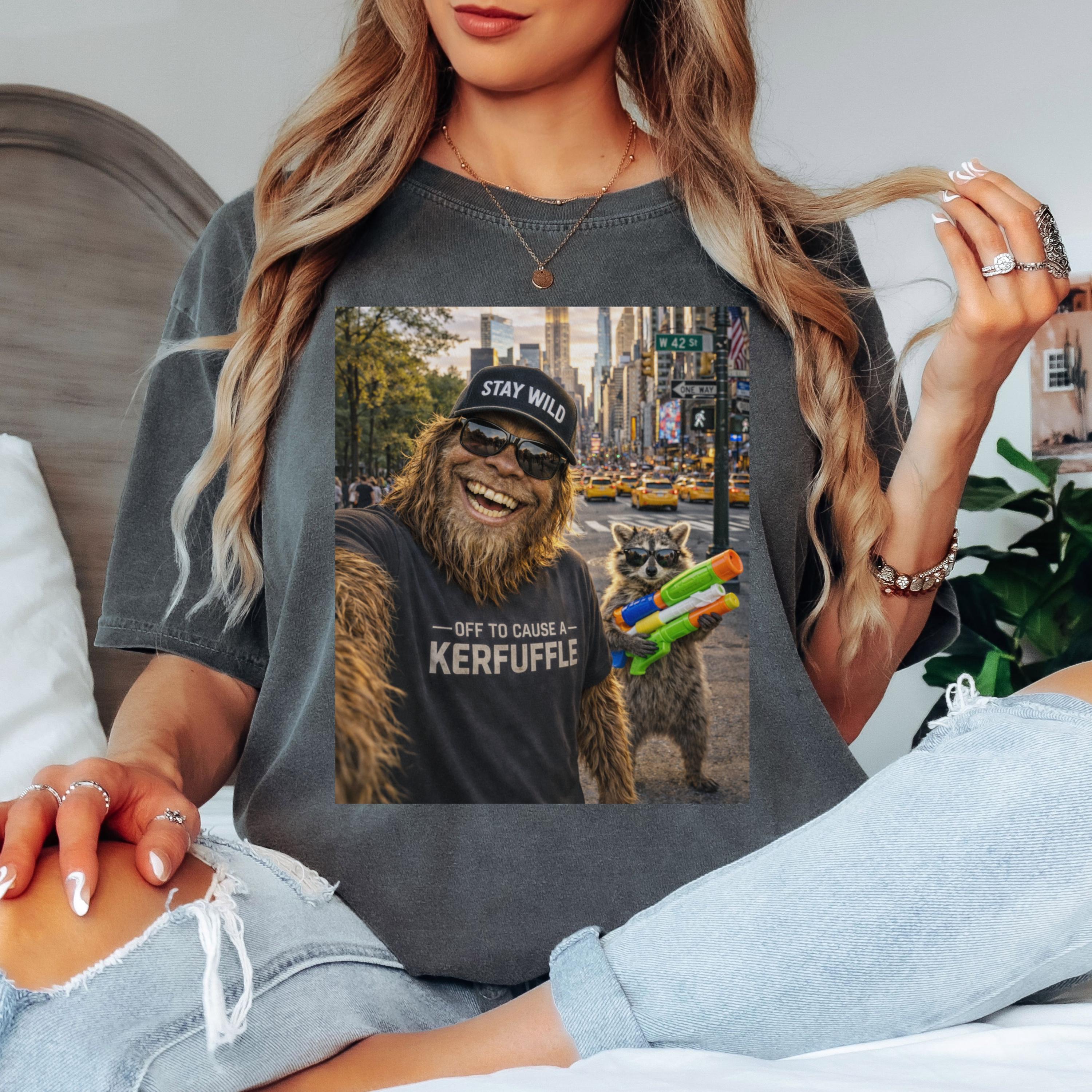 Off To Cause A Kerfuffle Comfort Colors Shirt, Funny Raccoon Bigfoot Graphic Tee, Sasquatch Cryptid Shirt