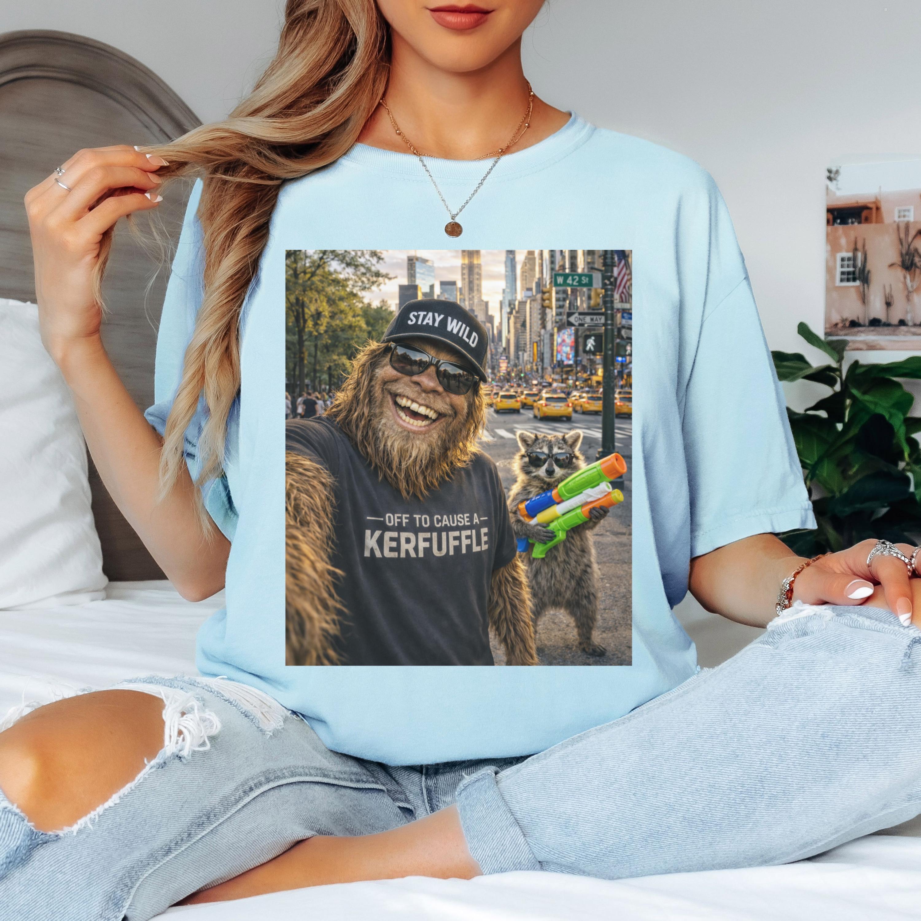 Off To Cause A Kerfuffle Comfort Colors Shirt, Funny Raccoon Bigfoot Graphic Tee, Sasquatch Cryptid Shirt
