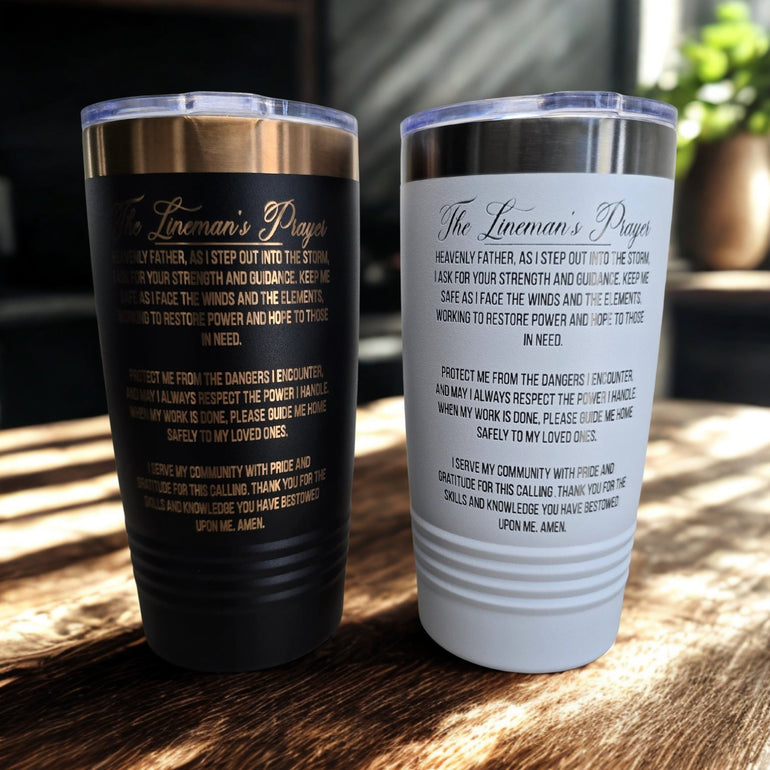Back side of black and white Lineman’s Prayer tumblers showing engraved prayer text