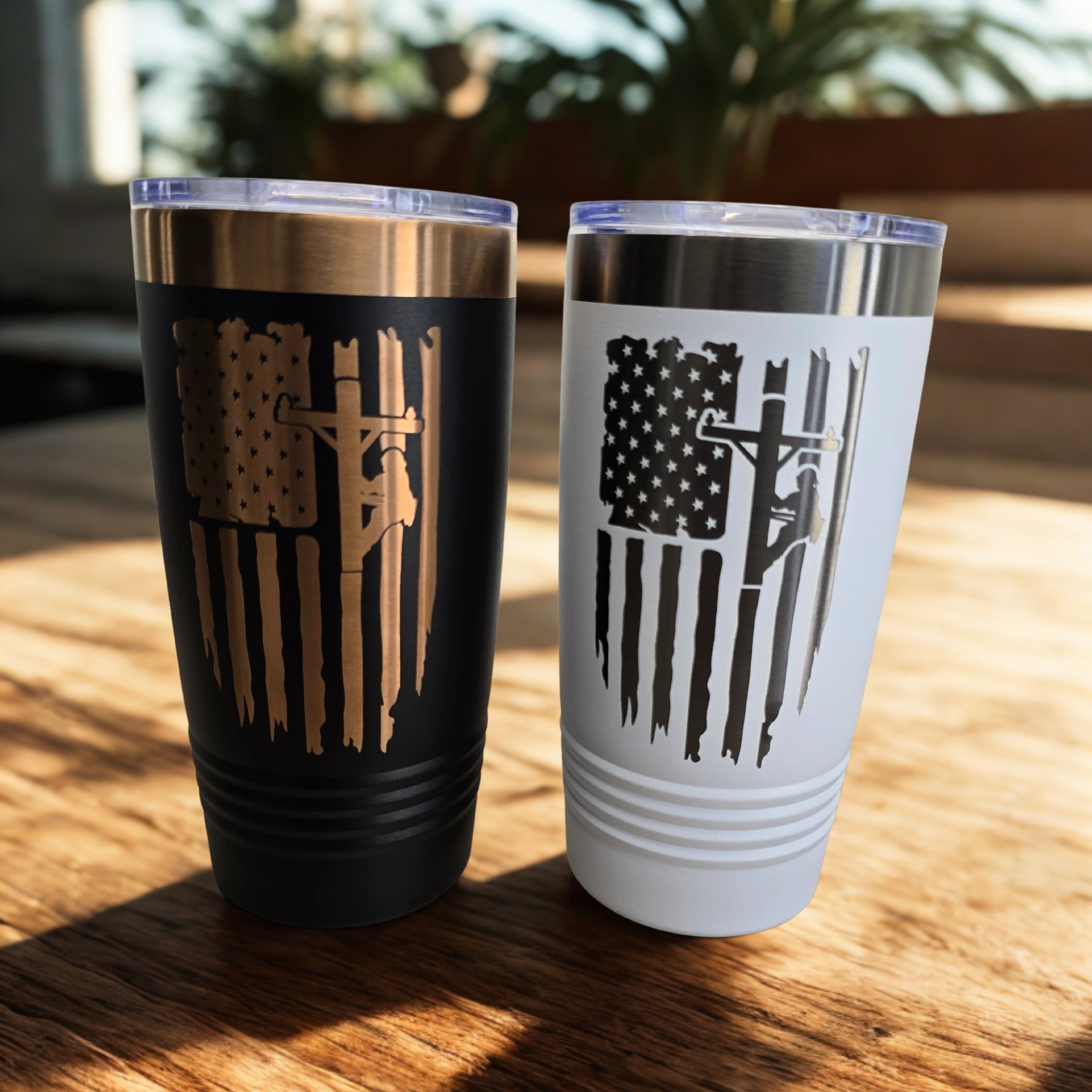 Black and white Lineman’s Prayer tumblers with engraved American flag and utility worker design