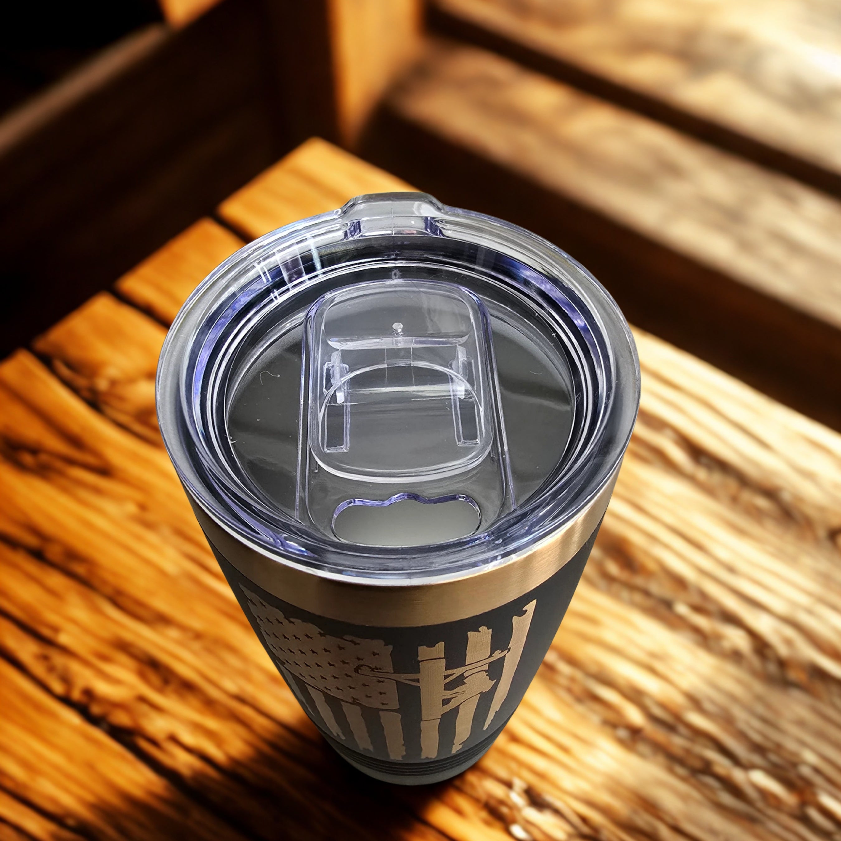 Clear sliding lid detail on black Lineman’s Prayer tumbler