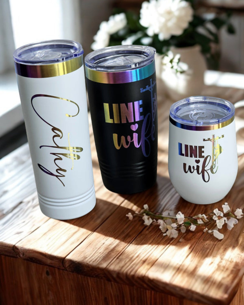 Linewife drinkware gift set with black tumbler, white tumbler, and white insulated cup