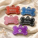 Personalized crystal pet ID tags with engraved names in multiple colors