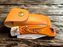 Personalized lineman folding knife with engraved wooden handle and leather sheath