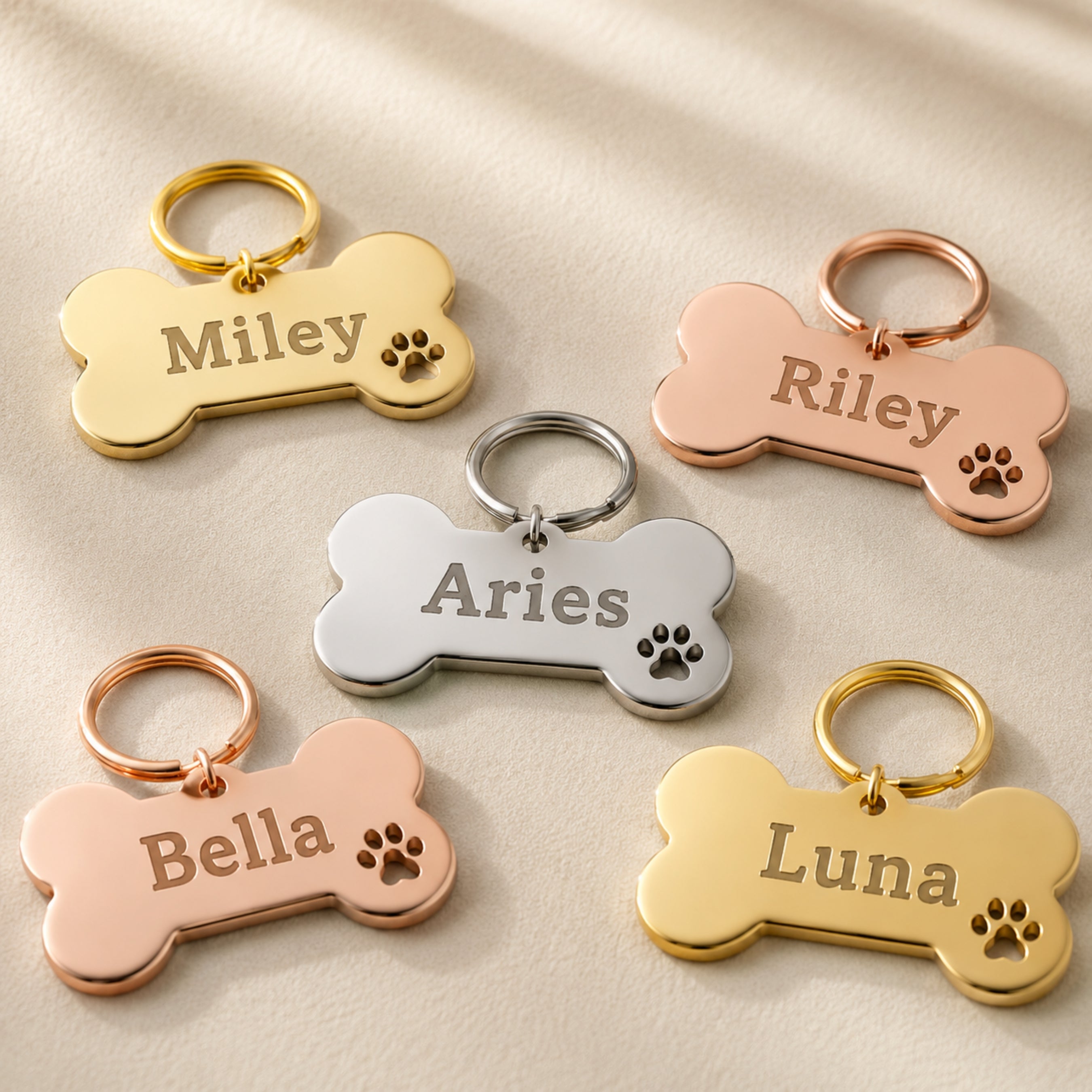 Personalized stainless steel bone pet tags in gold silver and rose gold finishes