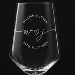 Close-up of permanent engraving with couple names, initials, and wedding date