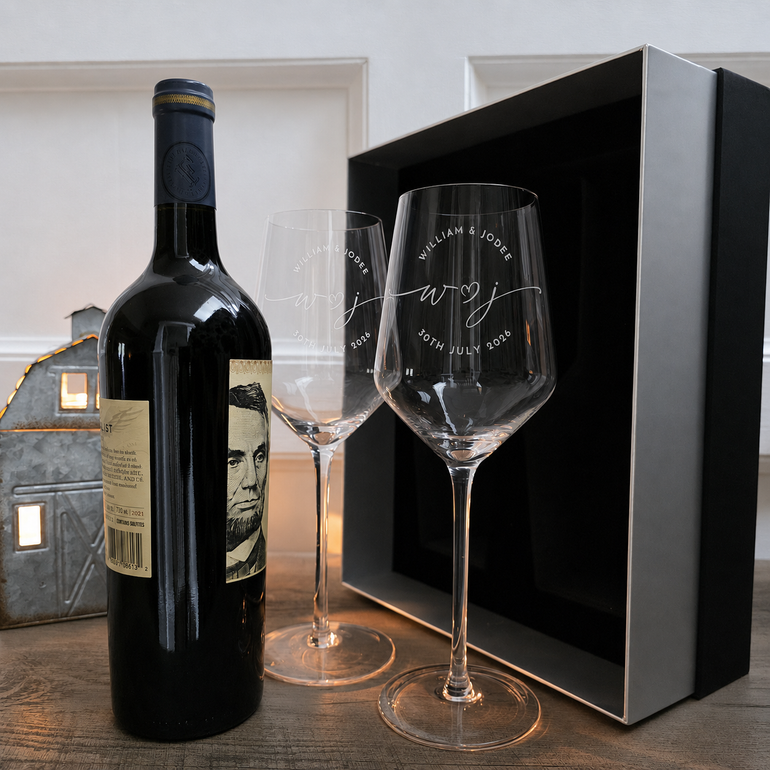 Two personalized wine glasses with a wine bottle and presentation box; wine not included
