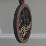 Side view of layered wood lineman Christmas ornament with ribbon hanger