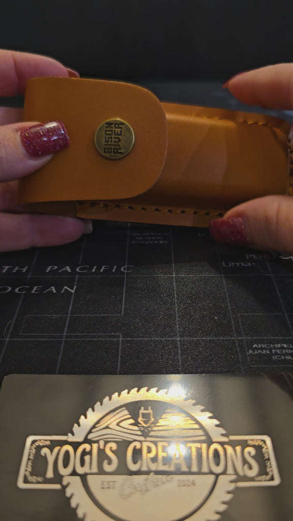 Video showing personalized lineman folding knife and leather sheath