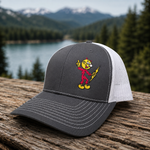 Reddy Kilowatt embroidered Charcoal / White Richardson 112 trucker hat outdoors