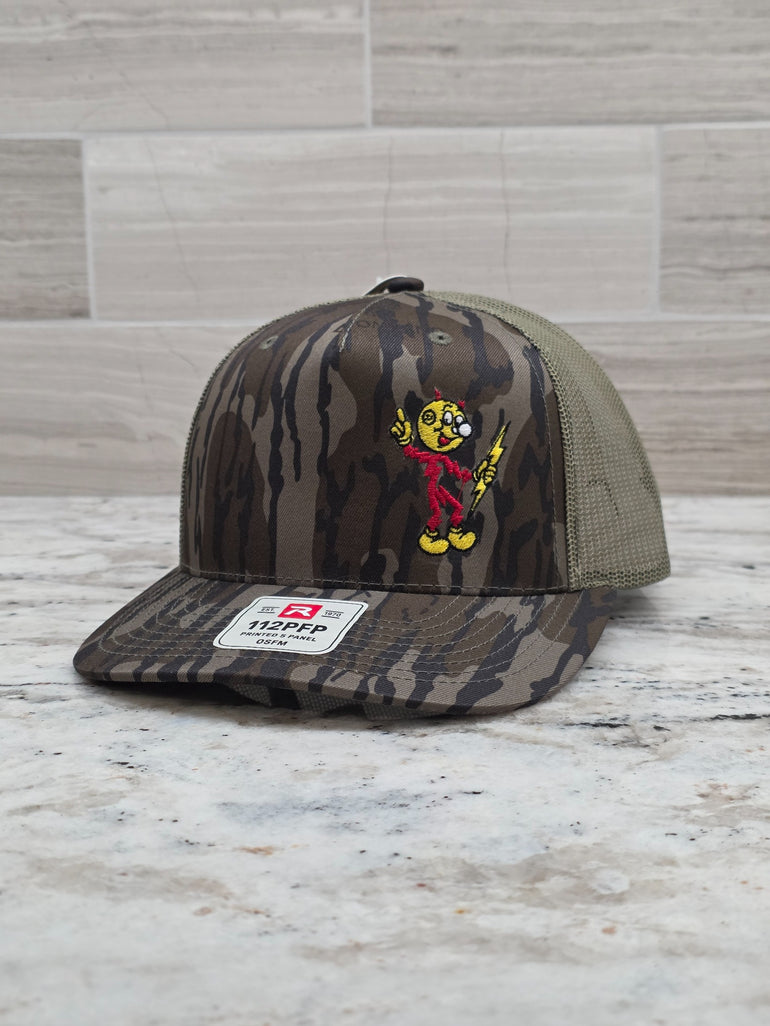 Actual Reddy Kilowatt embroidered Mossy Oak Bottomland and loden Richardson 112P trucker hat