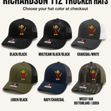 Six Reddy Kilowatt embroidered Richardson trucker hat colors: Black / Black, Multicam Black / Black, Charcoal / White, Loden / Black, Navy / Charcoal, and Mossy Oak Bottomland / Loden