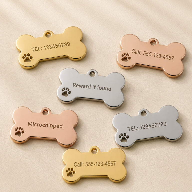 Back engraving example on stainless steel bone pet tags with phone number and pet safety details