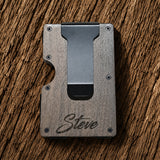 Back side of walnut lineman wallet showing personalized name engraving on the money clip