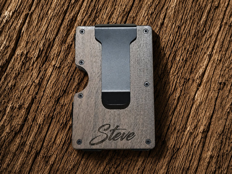 Back side of walnut lineman wallet showing personalized name engraving on the money clip