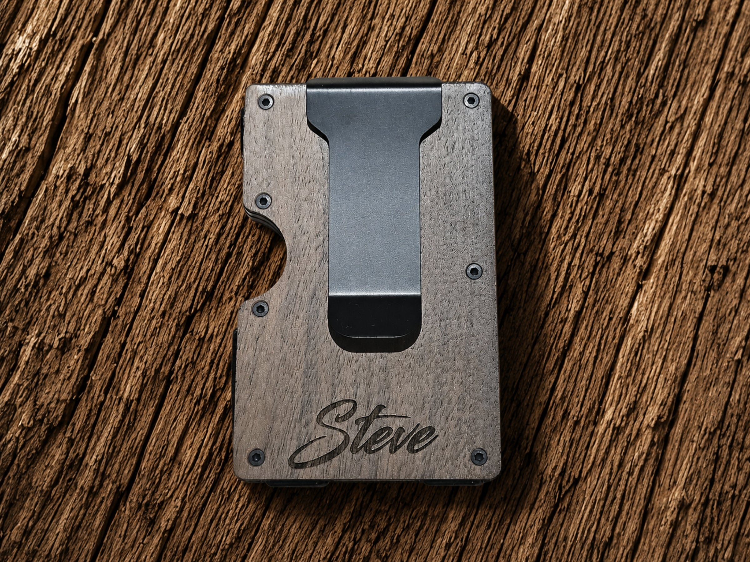 Back side of walnut lineman wallet showing personalized name engraving on the money clip