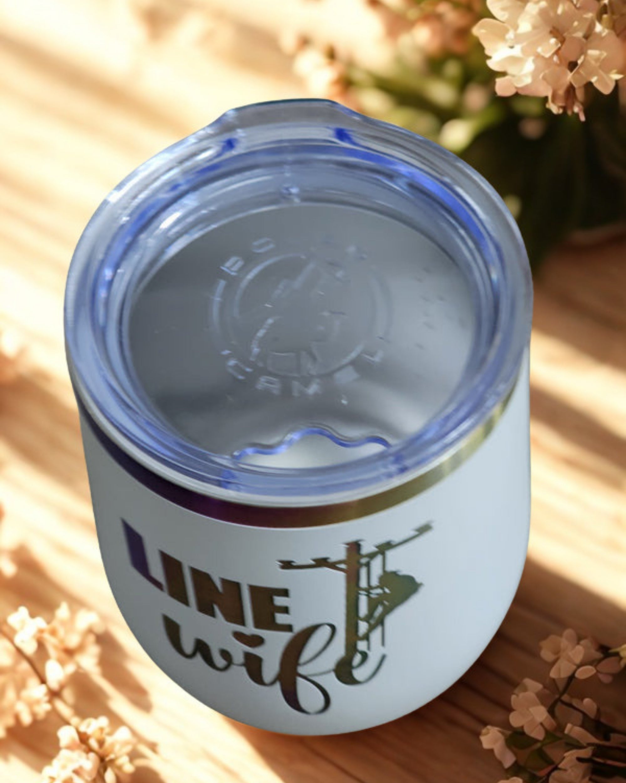 Top view of white Linewife insulated cup with clear slip-on lid
